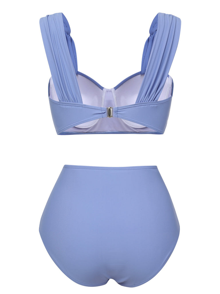 This Blue Grey 1960s Wide Strap Wrinkle Swimsuit carries 1960s vacation dreams in every stitch