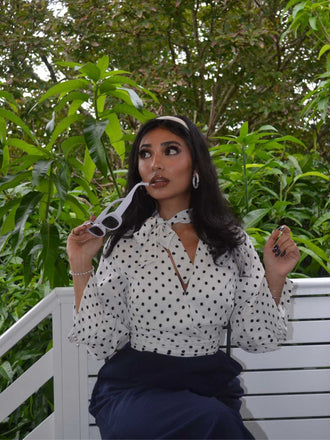 She finds her 1930s story in this Blue & White 1930s Polka Dots Tie Neck Jumpsuit