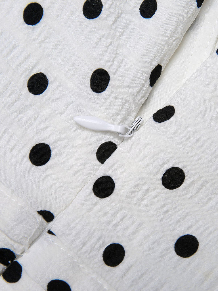 This Blue & White 1930s Polka Dots Tie Neck Jumpsuit whispers 1930s secrets to those who notice