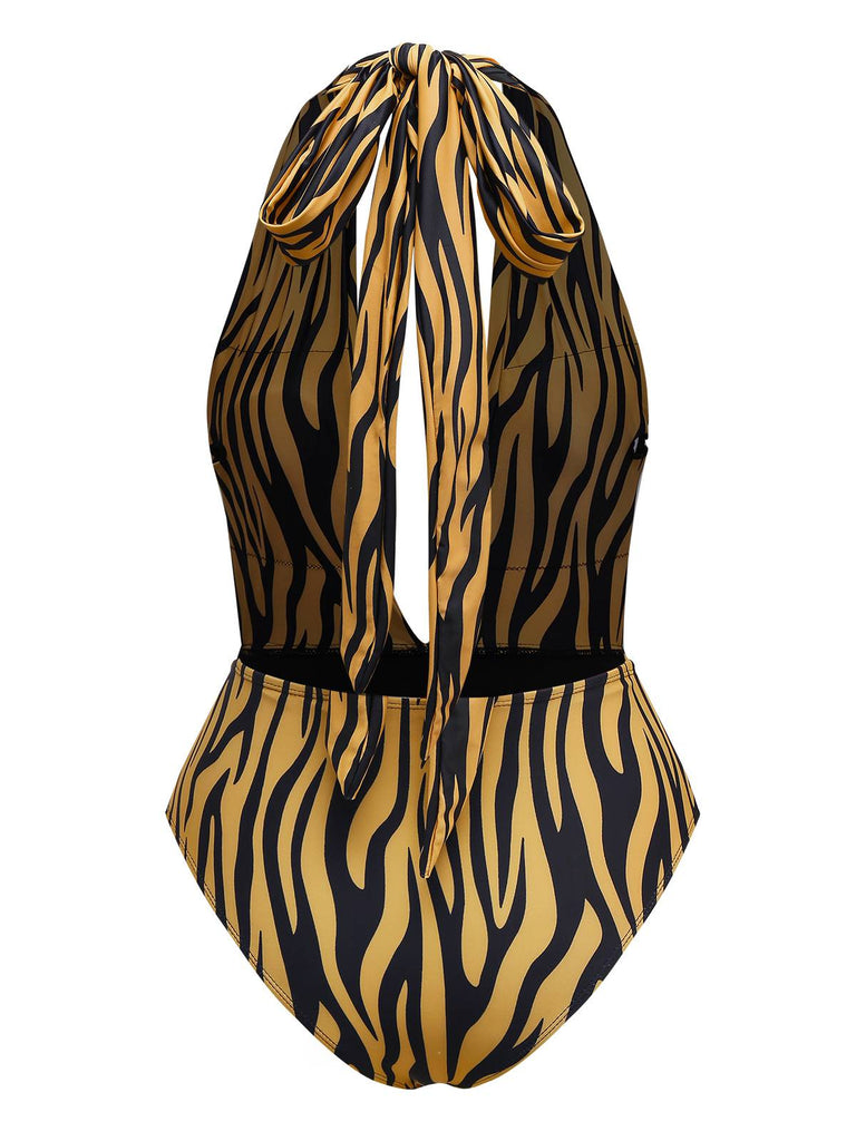 This Brown 1960s Deep-V Zebra Stripe One-Piece Swimsuit carries 1960s vacation dreams in every stitch