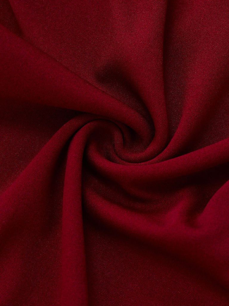 Close-up of dark red fabric with folds