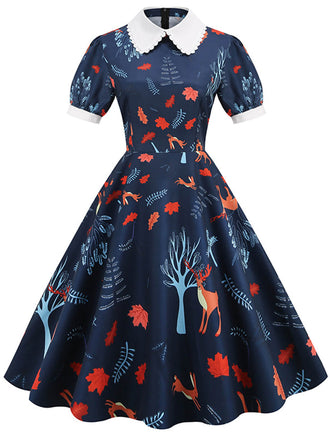 She slips into this Dark Blue 1950s Forest Puff Lapel Dress and suddenly it's a 1950s daydream