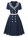 This Dark Blue 1950s Sailor Style Double Breasted Dress wraps her in 1950s elegance, one twirl at a time
