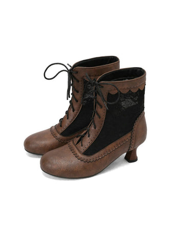 Pair of brown lace-up boots with black ribbons on a white background