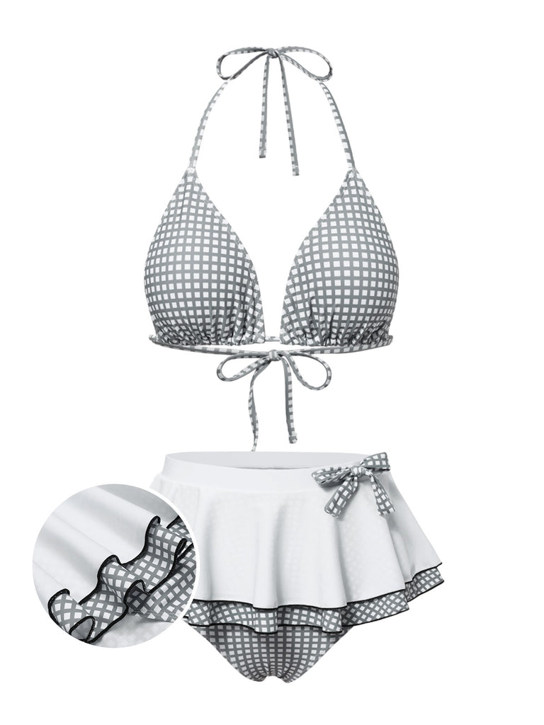 She's wearing Gray & White 1940s Gingham Plaid Bow Halter Swimsuit and the whole beach remembers the 1940s