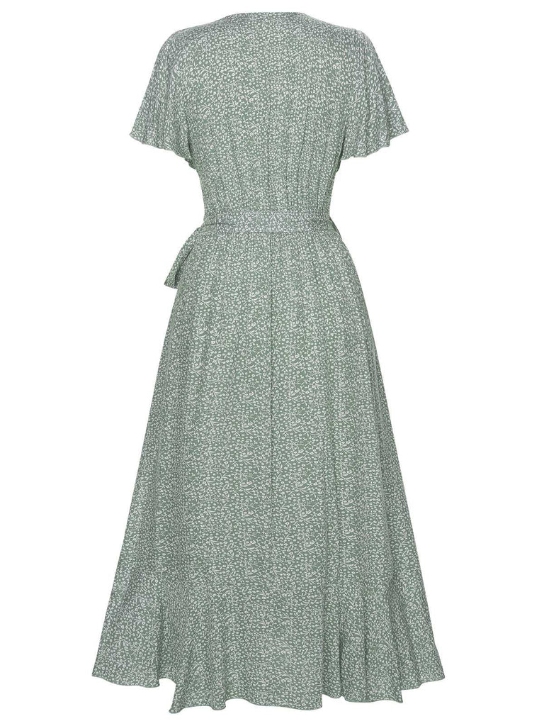 This Green 1940s Ditsy Floral Flounce Sleeve Dress wraps her in 1940s elegance, one twirl at a time