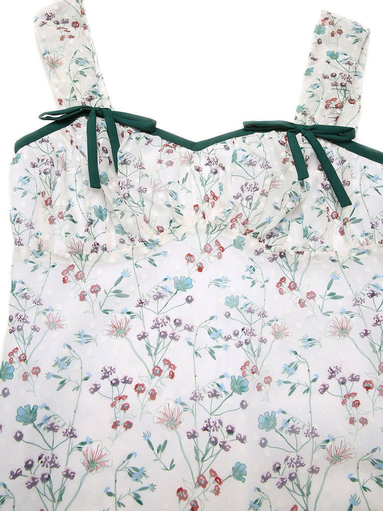 Floral dress with green straps on a white background