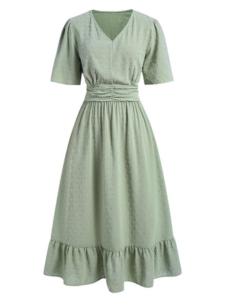 She slips into this Green 1940s Swiss Dots Ruffle Hem Dress and suddenly it's a 1940s daydream