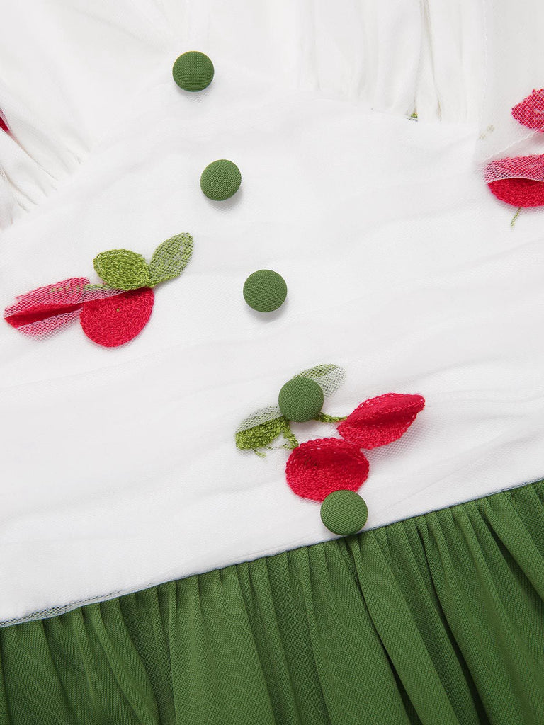 She slips into this Green 1950s Cherry V-Neck Mesh Patchwork Dress and suddenly it's a 1950s daydream