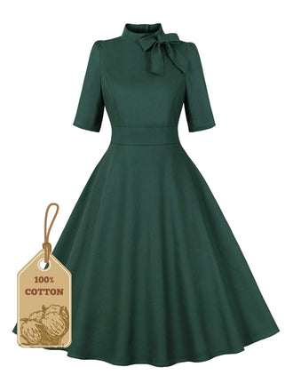 She slips into this Green 1950s Cotton Tie Elbow Sleeves Dress and suddenly it's a 1950s daydream