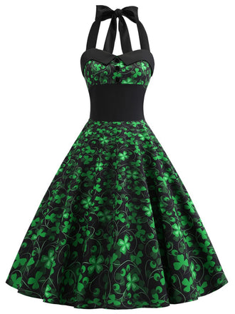 She slips into this Green 1950s Lucky Clover Halter Patchwork Dress and suddenly it's a 1950s daydream