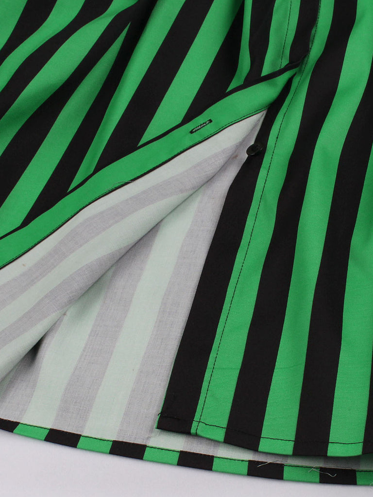 She slips into this Green 1950s Tie Neck Button Black Stripes Dress and suddenly it's a 1950s daydream