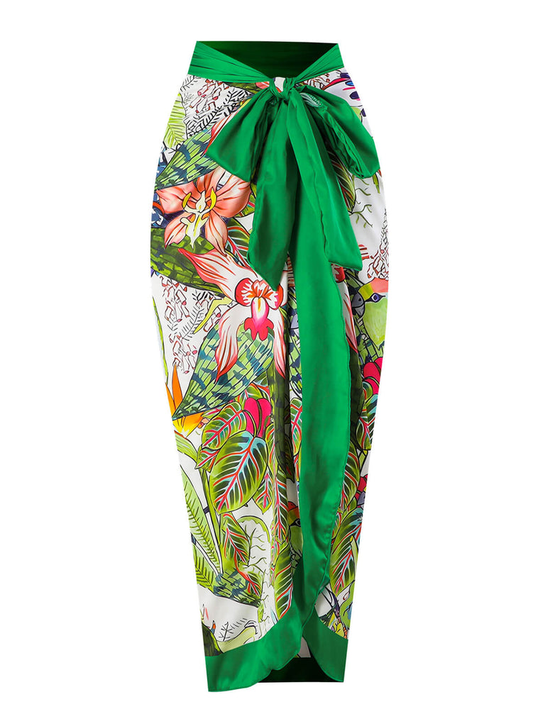 This Green 1960s Floral Bird Swimsuit & Cover-Up carries 1960s vacation dreams in every stitch