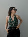 Front view: vintage Green Jaguar Vintage Halter One-piece Swimsuit, perfect for vintage themed parties and retro fashion enthusiasts
