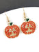 This Halloween Rhinestones Grimace Pumpkin Earrings carries vintage stories waiting to be told
