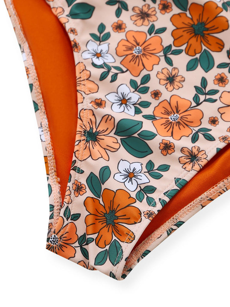 Fabric texture: 1930s 1930s Floral Ruffle Cutout Tie-Front One-Piece Swimsuit, perfect for retro themed parties, vintage fashion enthusiasts and special occasions