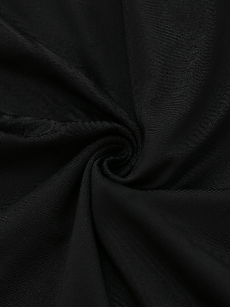 Black & White 1960s Ruffled Peplum Dress