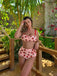 She's wearing Lace Strawberry Cami Tankini Set and the whole beach remembers the vintage
