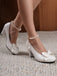 She finds her vintage story in this Leather Bowknot Ankle Strap Chunky Heels