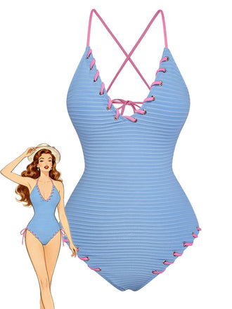Blue swimsuit with pink accents on a white background