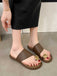 She's wearing Metal Thumb-Toe Beach Sandals and the whole beach remembers the vintage