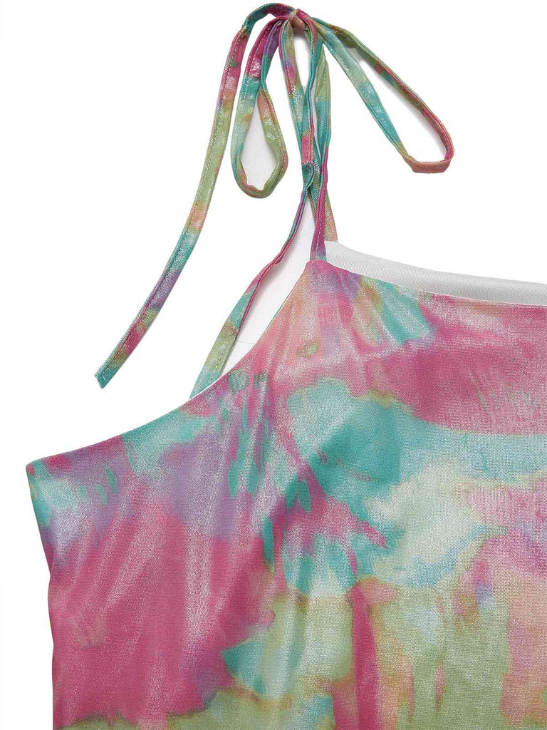 Colorful tie-dye top with halter neck design on a white background