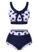 She's wearing Navy Blue 1950s Polka Dots High-Waist Swimsuit and the whole beach remembers the 1950s