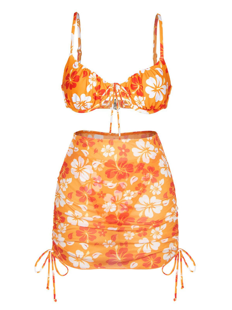 She's wearing Orange 1950s Silhouette Floral Straps Skirt Bikini and the whole beach remembers the 1950s