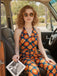 Orange 1970s Halter Geometric Print Jumpsuit, vintage romper, retro jumpsuit - perfect for women who love vintage and retro fashion