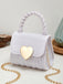 Patent Leather LOVE Handle Mini Handbag — vintage elegance in the palm of her hand