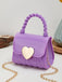 She adds this Patent Leather LOVE Handle Mini Handbag and suddenly it's vintage perfection