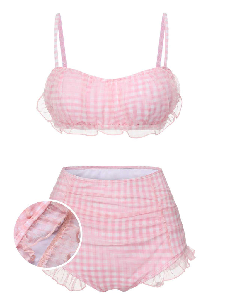 She's wearing Pink 1940s Spaghetti Strap Mesh Plaids Swimsuit and the whole beach remembers the 1940s