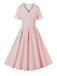 She slips into this Pink 1950s Blue Polka Dot Lapel Dress and suddenly it's a 1950s daydream