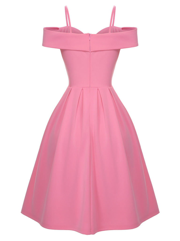 This Pink 1950s Cold Shoulder Solid Dress wraps her in 1950s elegance, one twirl at a time