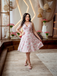 She slips into this Pink 1950s Floral V-Neck Dress and suddenly it's a 1950s daydream
