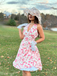 She slips into this Pink 1950s Floral V-Neck Dress and suddenly it's a 1950s daydream