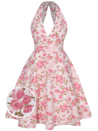 She slips into this Pink 1950s Floral V-Neck Dress and suddenly it's a 1950s daydream