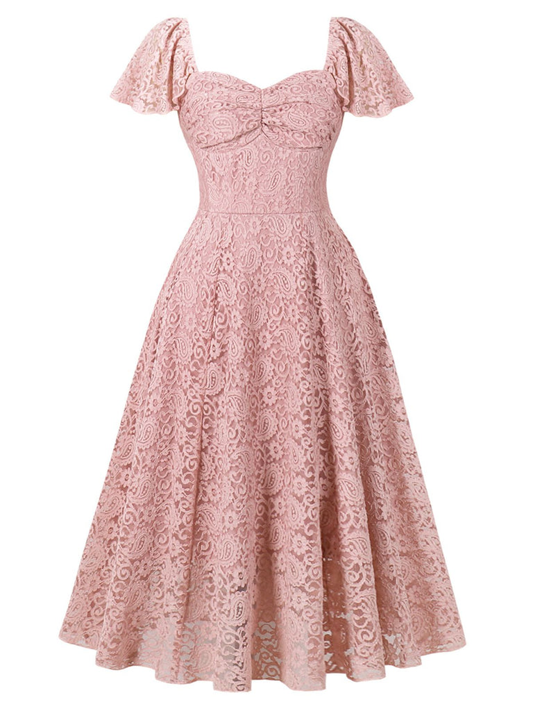 She slips into this Pink 1950s Solid Lace Heart Collar Dress and suddenly it's a 1950s daydream