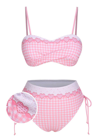 She's wearing Pink 1950s Spaghetti Strap Heart Plaids Swimsuit and the whole beach remembers the 1950s