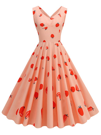 She slips into this Pink 1950s Strawberry Sleeveless Swing Dress and suddenly it's a 1950s daydream