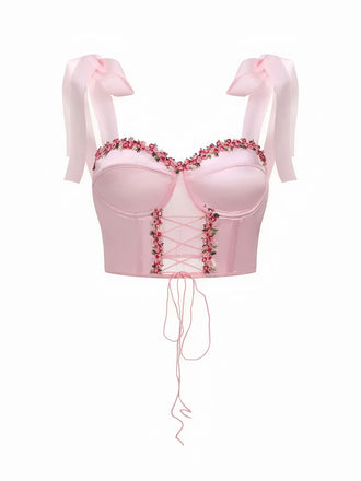 She pairs this Pink 1960s Floral Lace Herringbone Top with confidence and 1960s charm