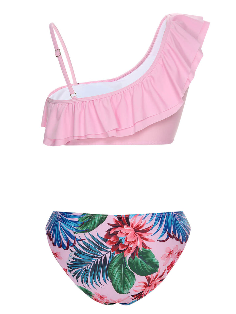 This Pink 1960s Tropical Plants Ruffles Swimsuit carries 1960s vacation dreams in every stitch