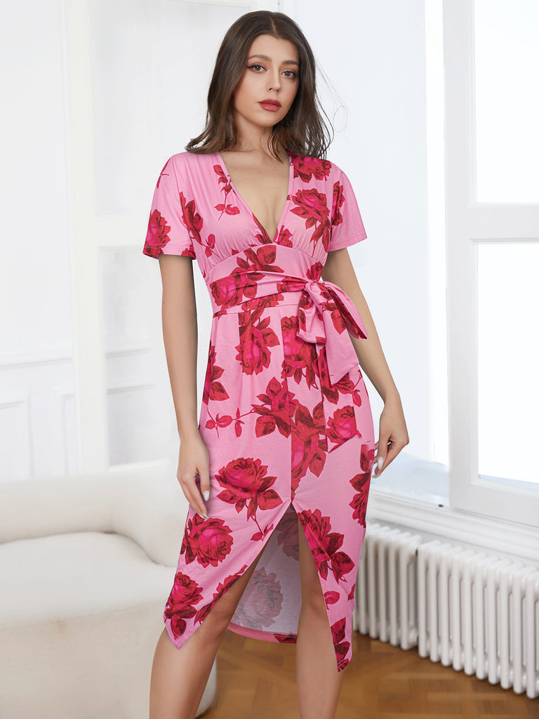 She slips into this Pink 1960s V-Neck Floral Tie Split Dress and suddenly it's a 1960s daydream