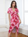 She slips into this Pink 1960s V-Neck Floral Tie Split Dress and suddenly it's a 1960s daydream