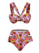 She's wearing Pink 1970s Boho Floral Cross Neck Swimsuit and the whole beach remembers the 1970s
