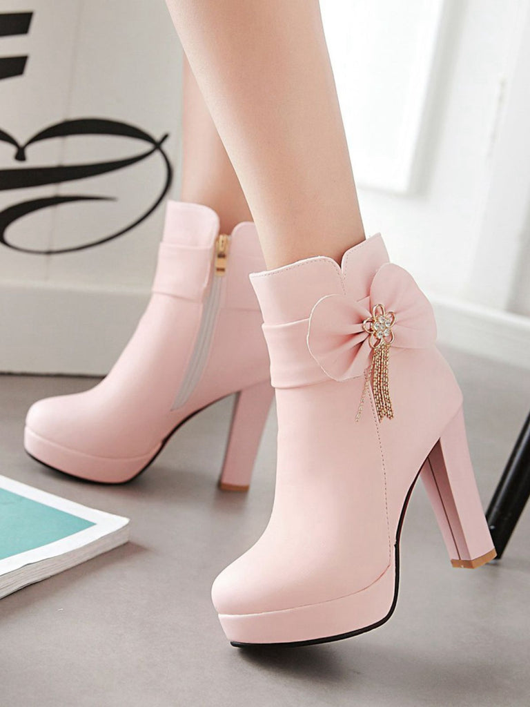 This Pink Leather Bow High Heel Ankle Boots whispers vintage secrets to those who notice