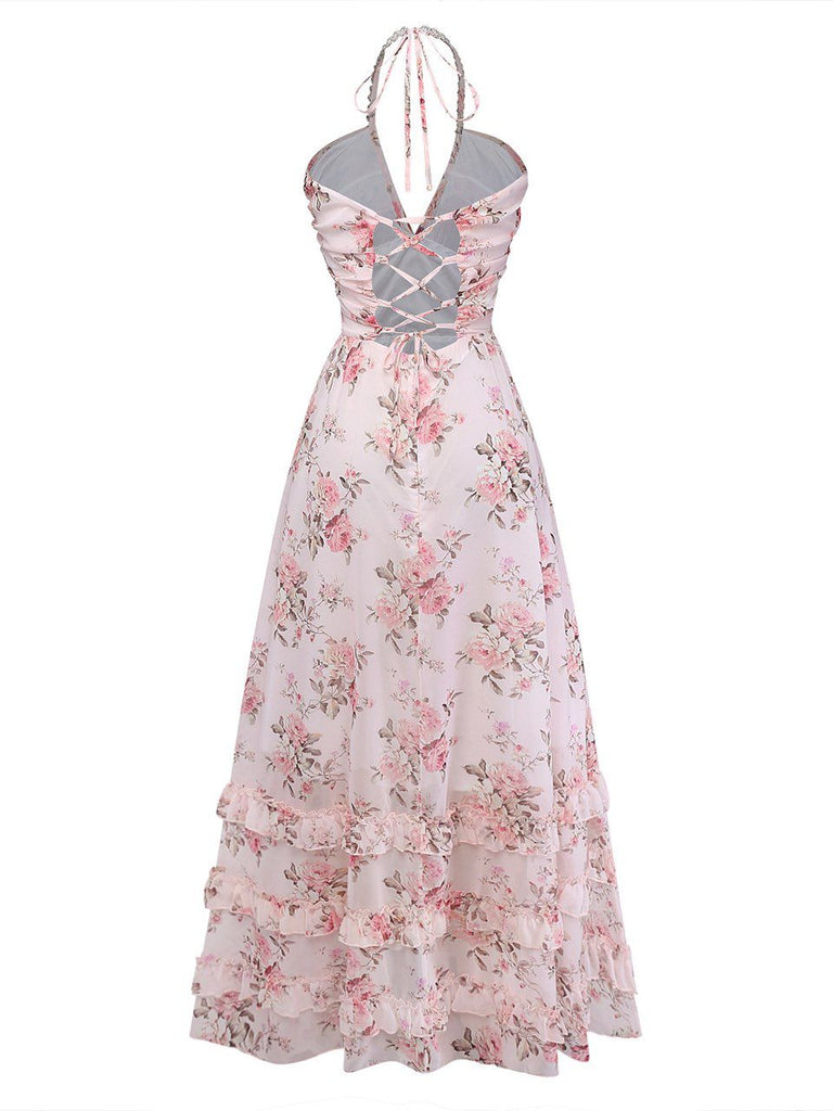 Floral dress with criss-cross straps on a white background
