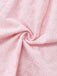 Pink fabric with floral pattern, close-up view