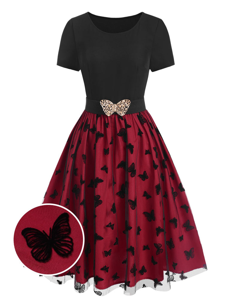 She slips into this Red 1950s Butterfly Embroidered Mesh Patchwork Dress and suddenly it's a 1950s daydream