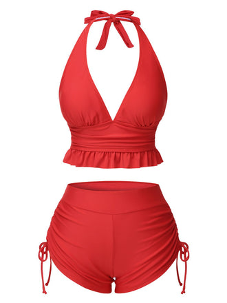 She's wearing Red 1950s Halter Solid Ruffle Tankini and the whole beach remembers the 1950s